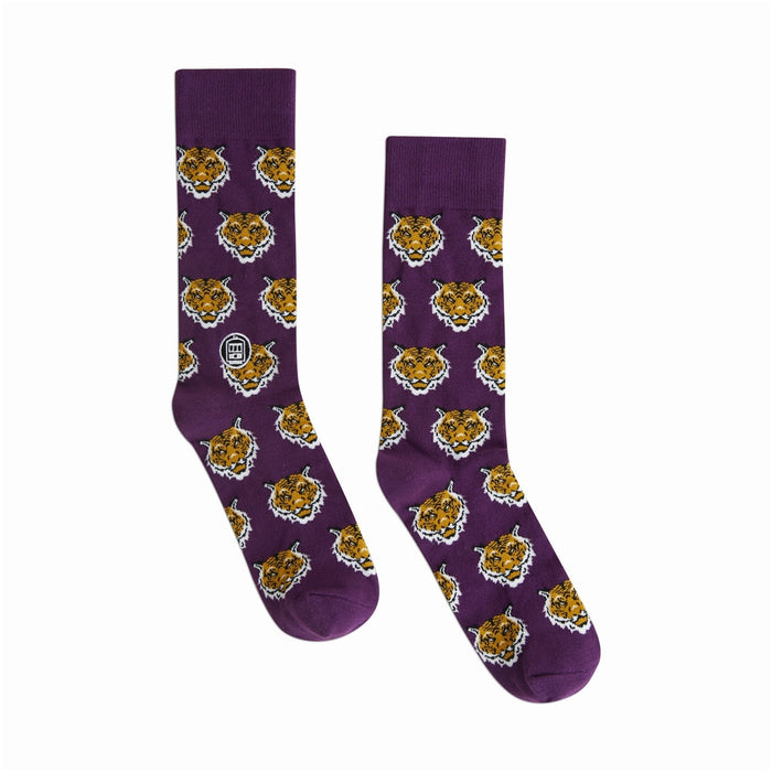 Purple crew socks with a gold tiger face print